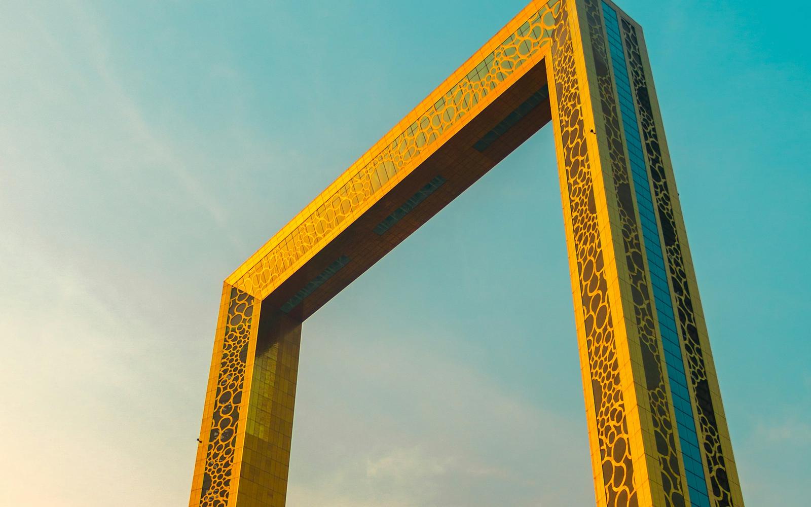 The Dubai Frame against a bright sky